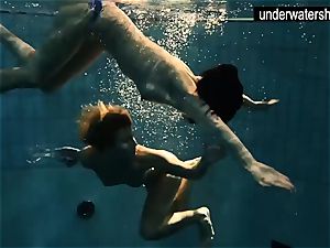 two sumptuous amateurs flashing their bodies off under water